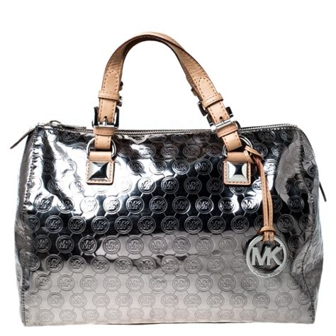 michael kors silver makeup bag|personalized Michael Kors bag.